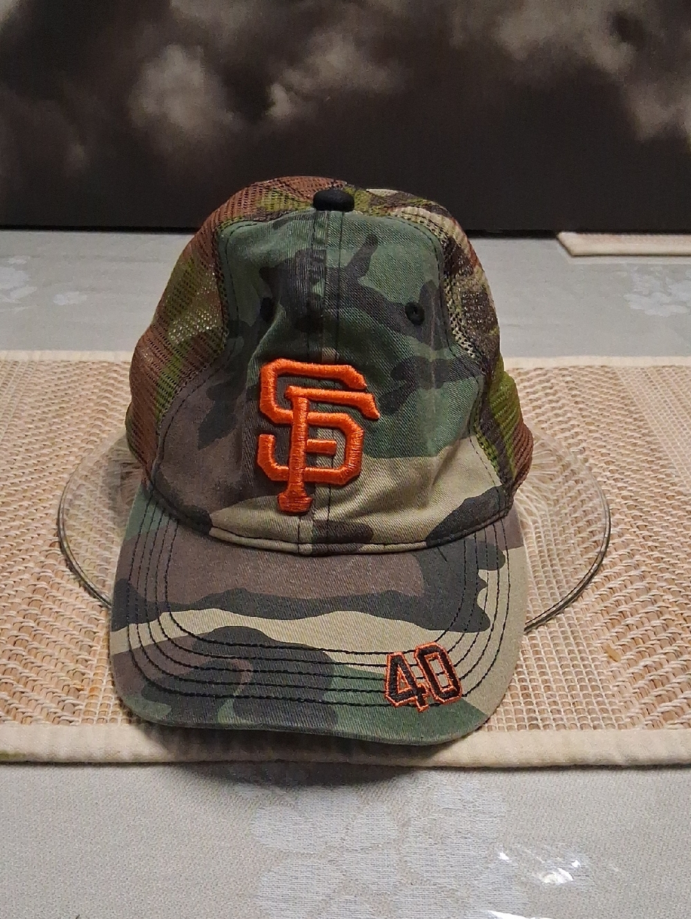 This is a San Francisco Giants camo trucker snapback hat, likely a New Era